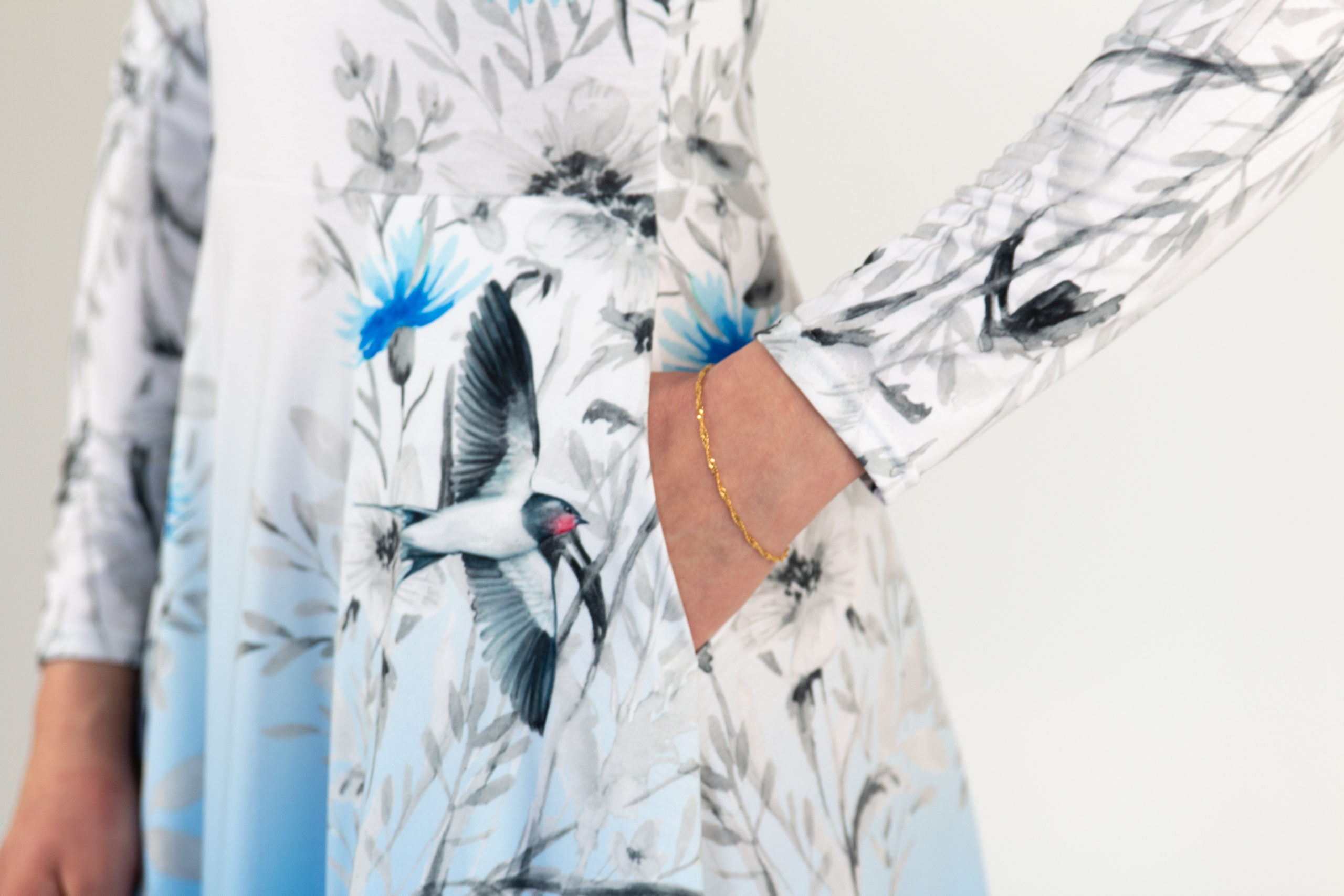 Taskutega midikleit Pääsukesed tasku detail