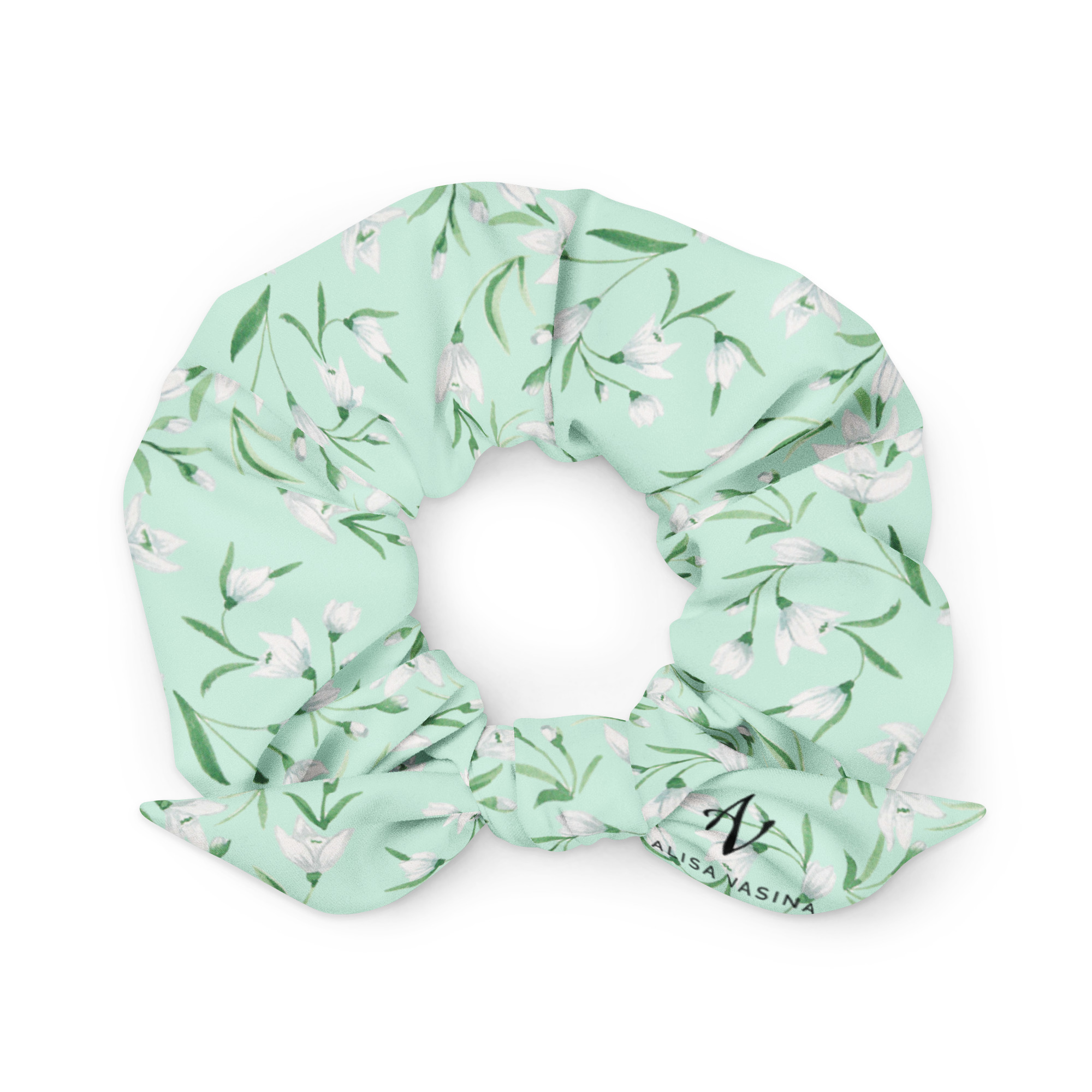 all-over-print-recycled-scrunchie-white-front-68487b7ea9f6f.jpg Juuksekumm lumikelluke
